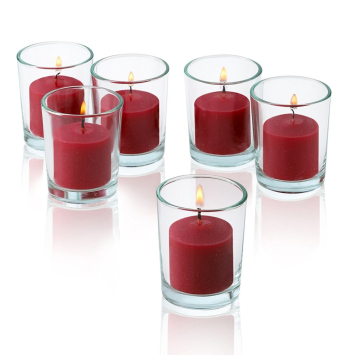 6 red color candles in glass holder in manila