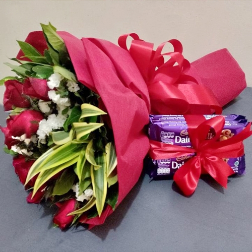 12 Red Roses with Cadbury Dairy Milk Chocolate